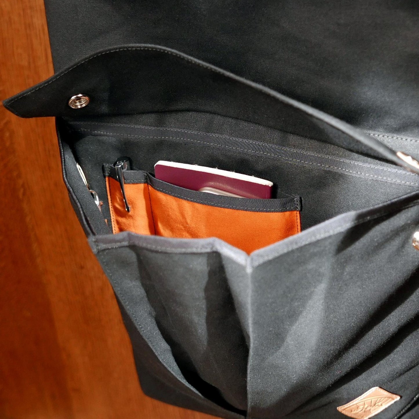 Portlander in black backpack - La Jefa and sons