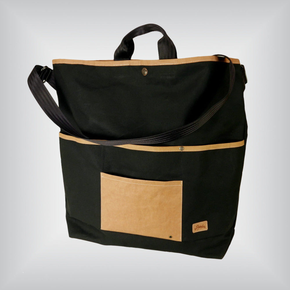Oversized canvas shopping tote designed to fit a Brompton folding bike.