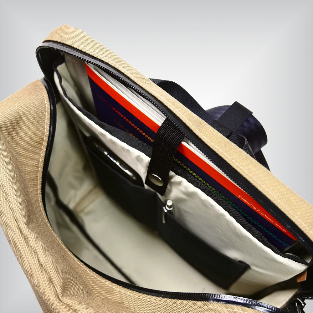 Functional front bag for Brompton bikes with 9.8-liter capacity, ideal for urban commuting.