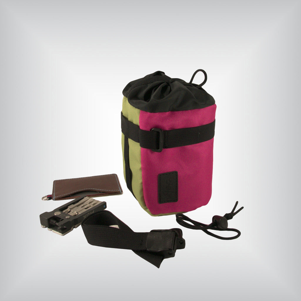 Pink and green bicycle pouch for tools