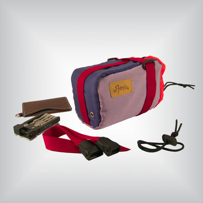Ultraviolet cycling feed bag with red accents.