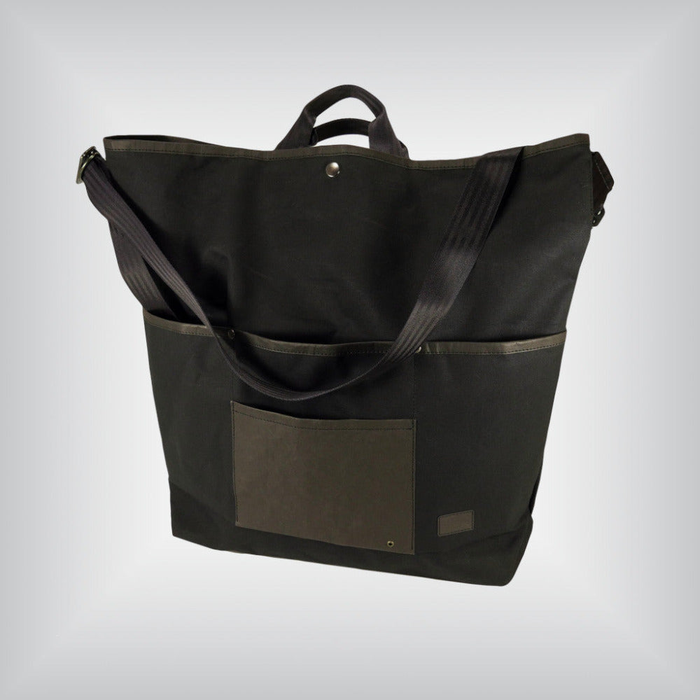 An oversized canvas tote for a Brompton folding bike.